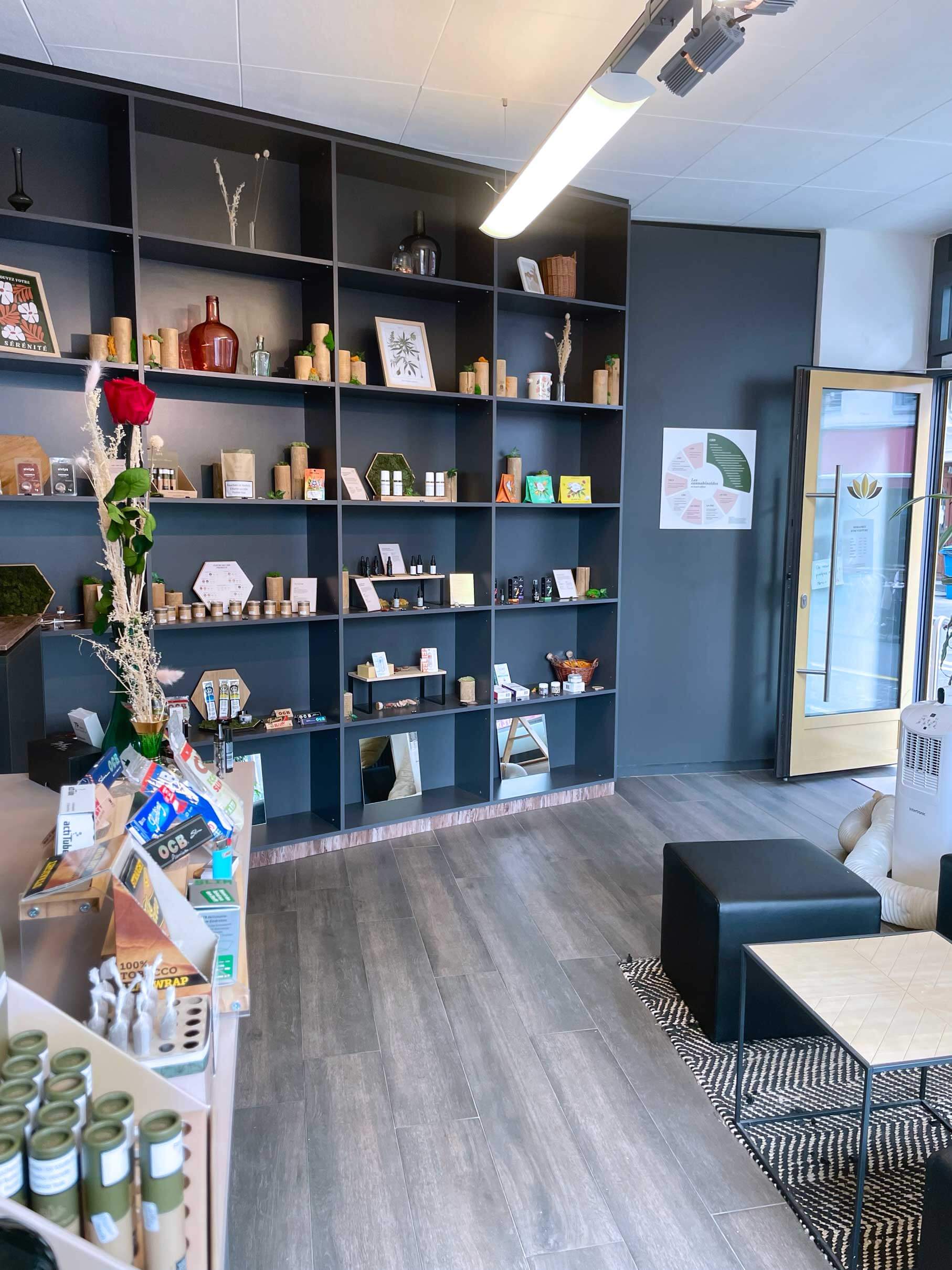 Aifé shop, interior view of the shelves and the shop entrance